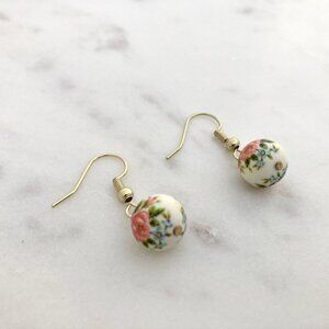 2/$20 Refreshed Gold Tone Floral Dangle Earrings